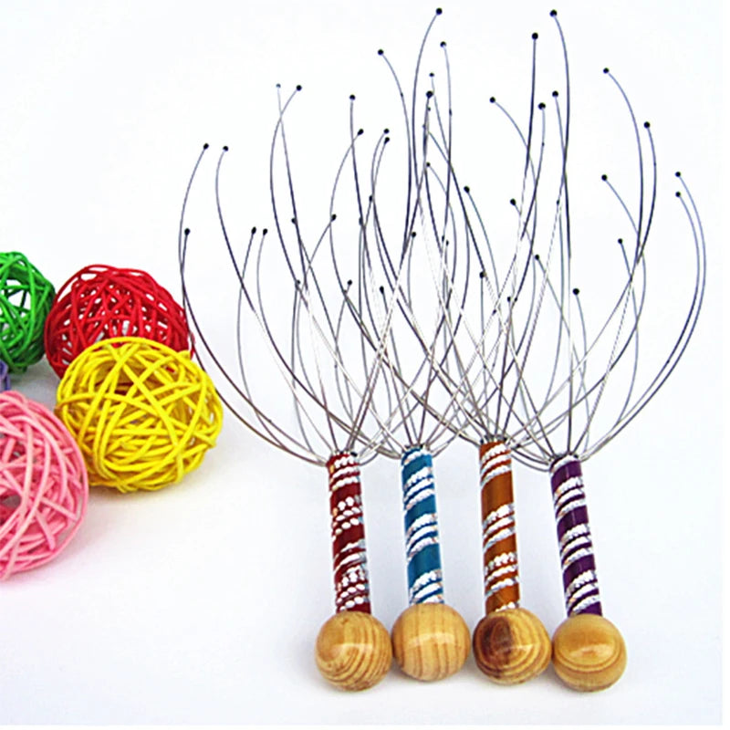 Set of scalp massagers with wooden handles and colorful yarn balls on a white background