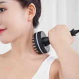 Woman using a handheld device on her neck against a white background