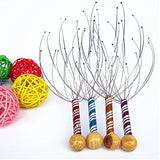 Set of scalp massagers with wooden handles and colorful yarn balls on a white background
