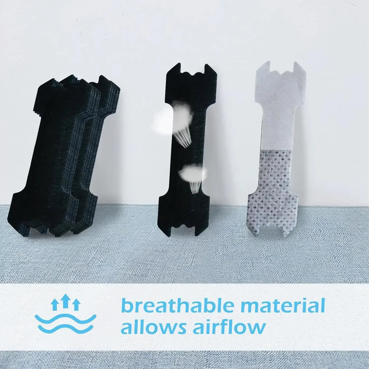 Three black and gray pet collars with breathable material feature on a light blue fabric background.