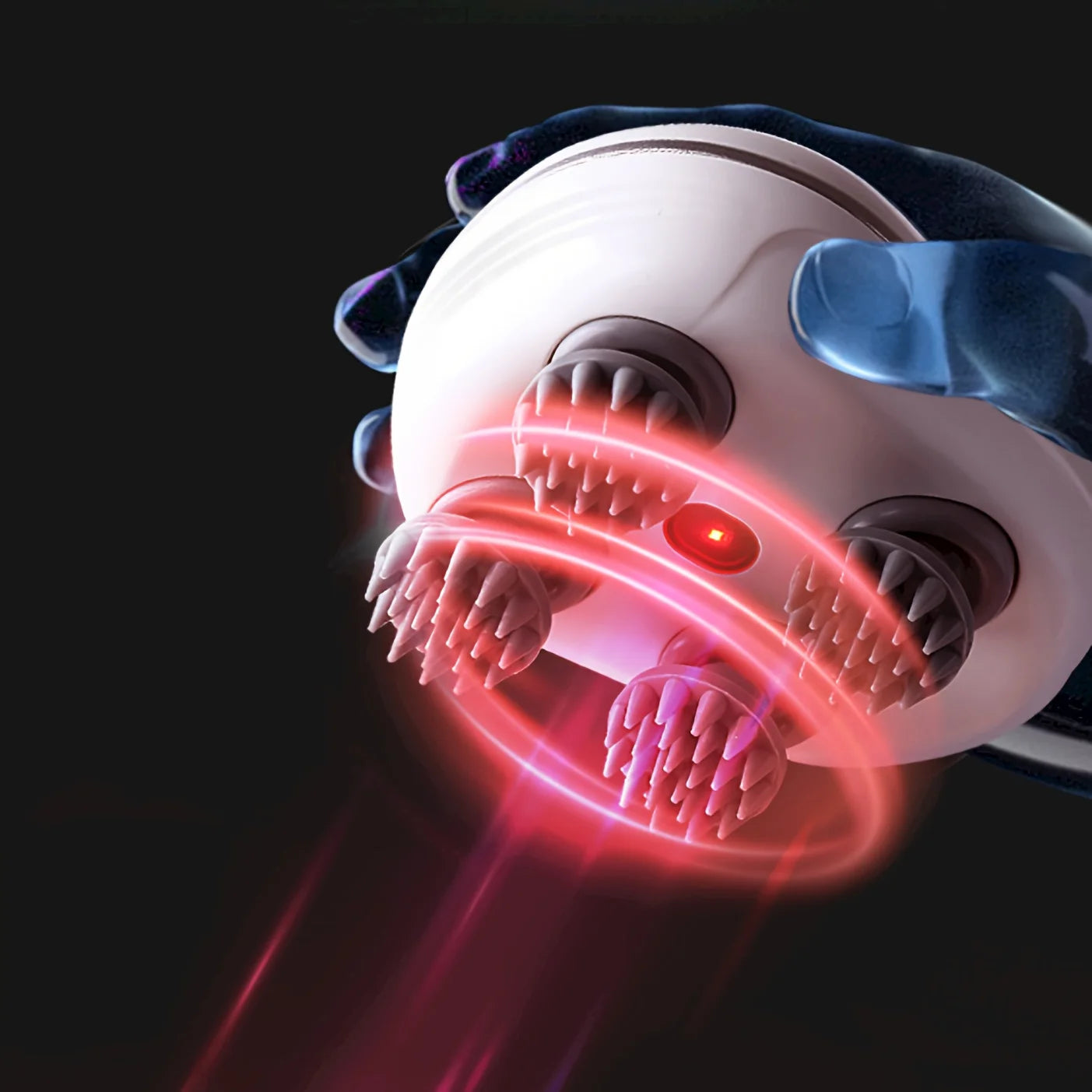 Close-up of a dental device with red light on a black background