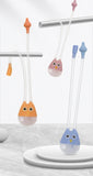 Children's toothbrushes with cartoon designs on a white background