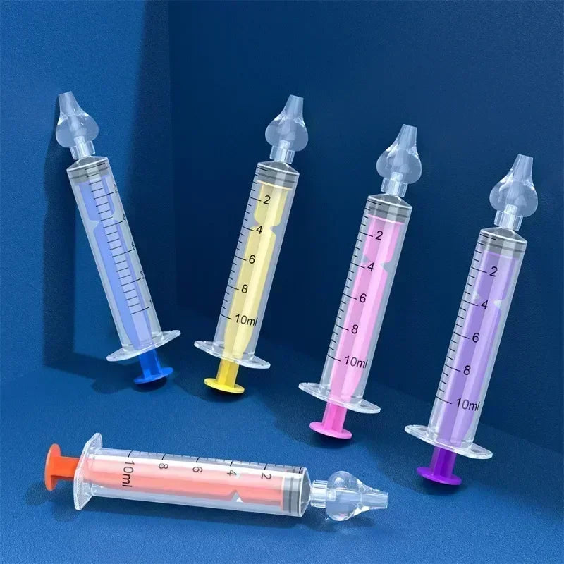Set of colorful syringes on a blue background