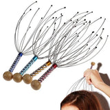 Set of scalp massagers with wooden handles on a white background